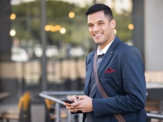 phone-portrait-and-happy-businessman-in-the-city-2023-11-27-05-12-47-utc-1