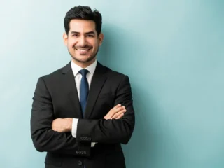 depositphotos_336474734-stock-photo-smiling-young-male-professional-standing