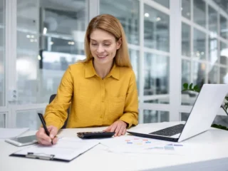 depositphotos_685050728-stock-photo-successful-mature-female-financial-accountant