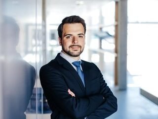 portrait-businessman-standing-office_1618840-1475