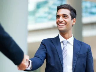 depositphotos_124795048-stock-photo-business-people-shaking-hands-2