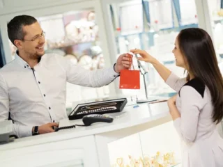 depositphotos_72747339-stock-photo-happy-woman-customer-in-a